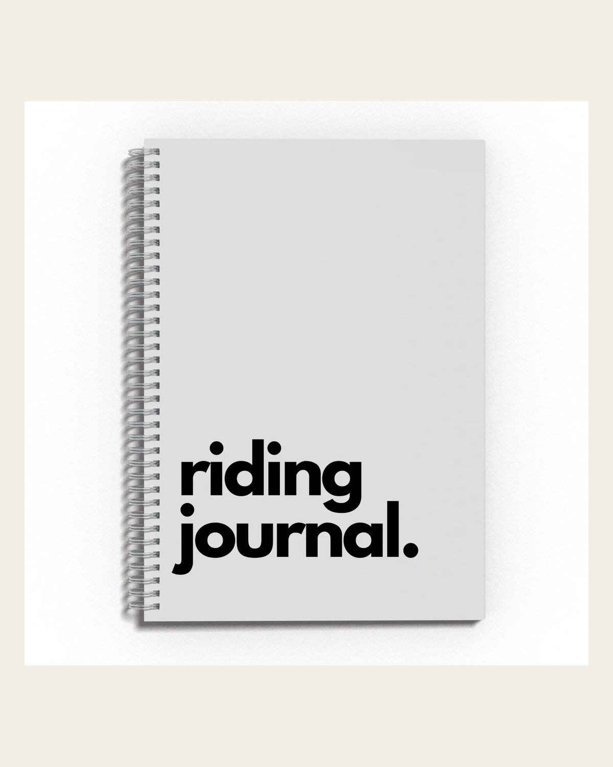 Riding Journal on a warm cream background