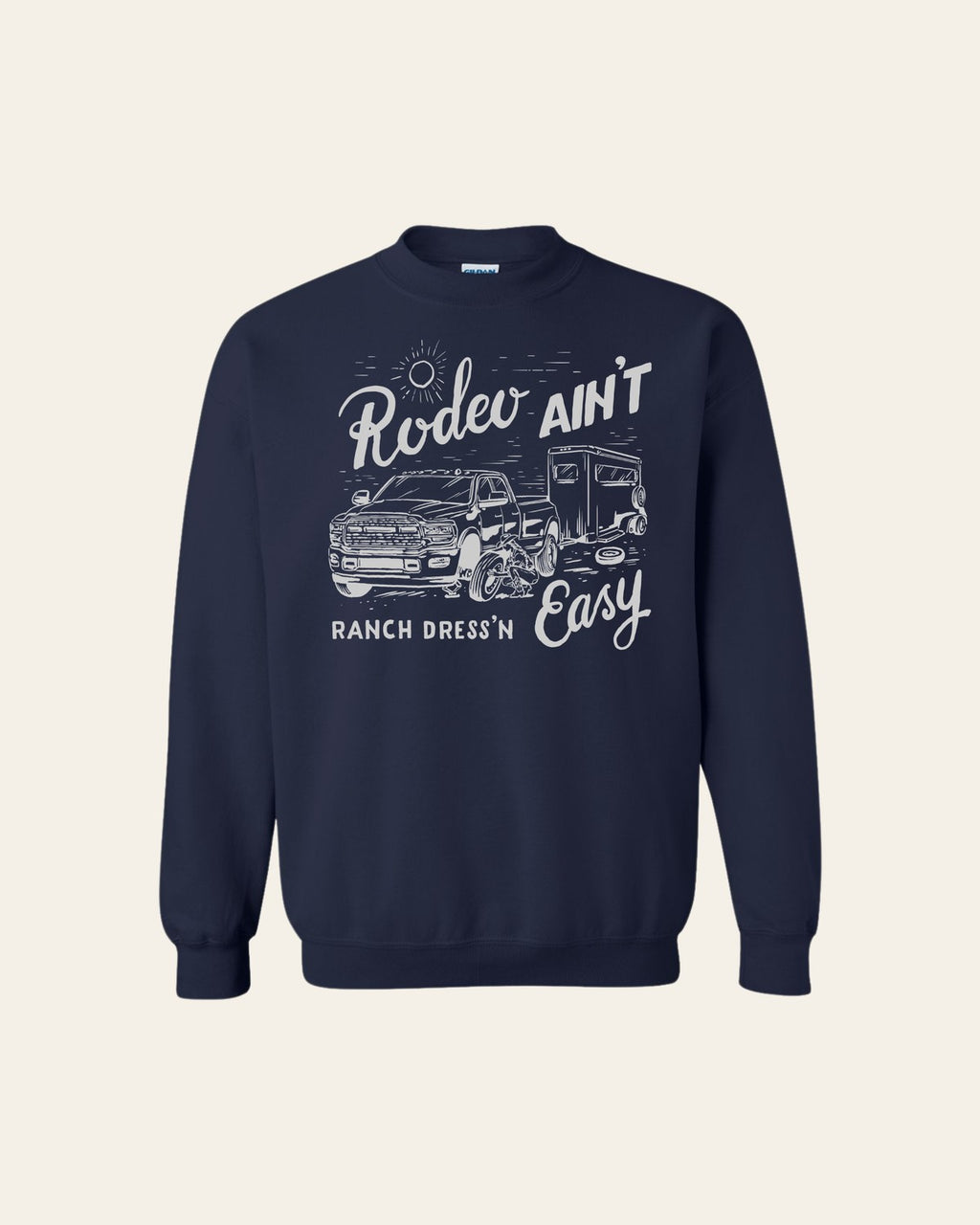 Rodeo Ain't Easy Navy Crewneck on a warm cream background