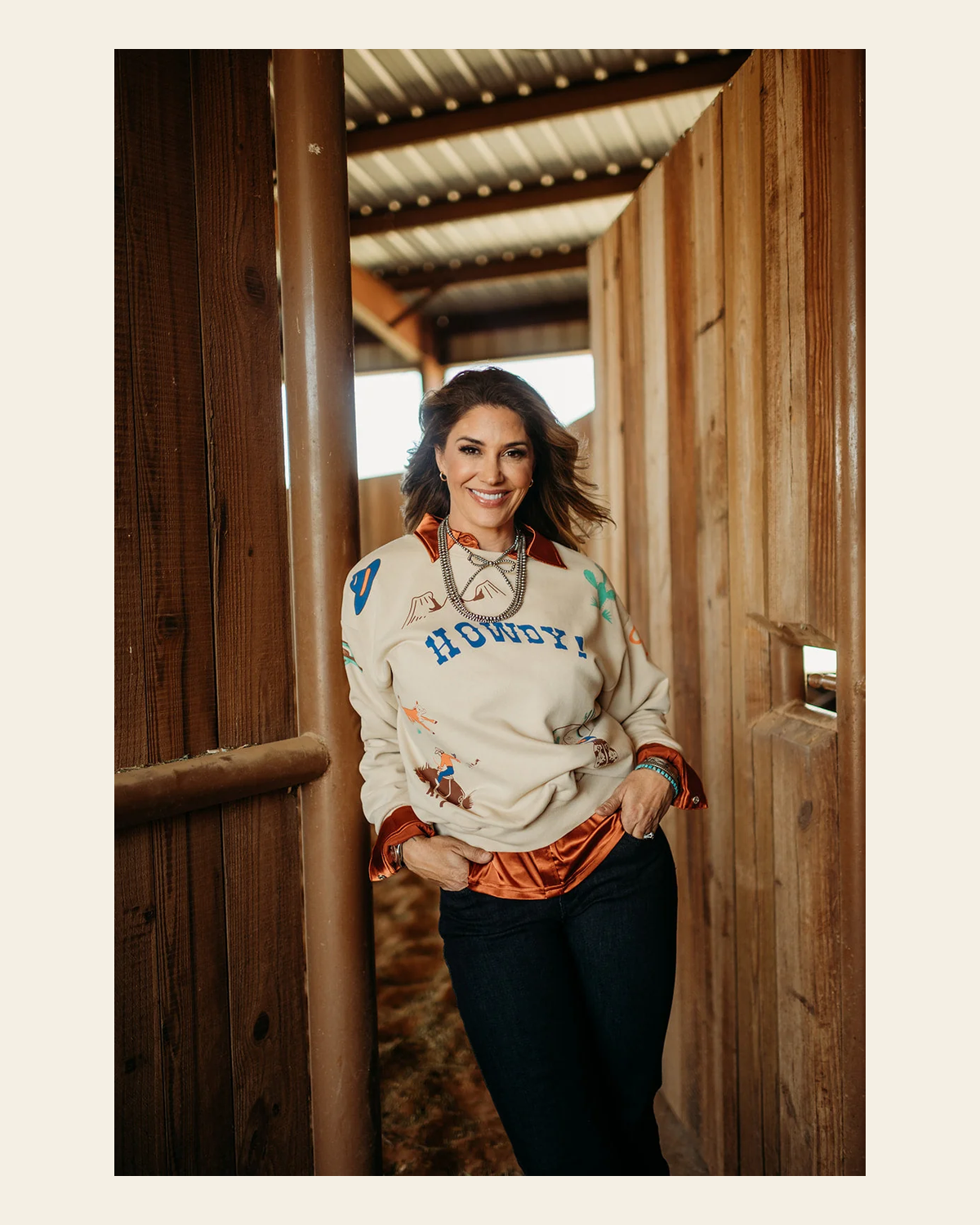 Western Graphic Howdy Sweatshirt on a warm cream background