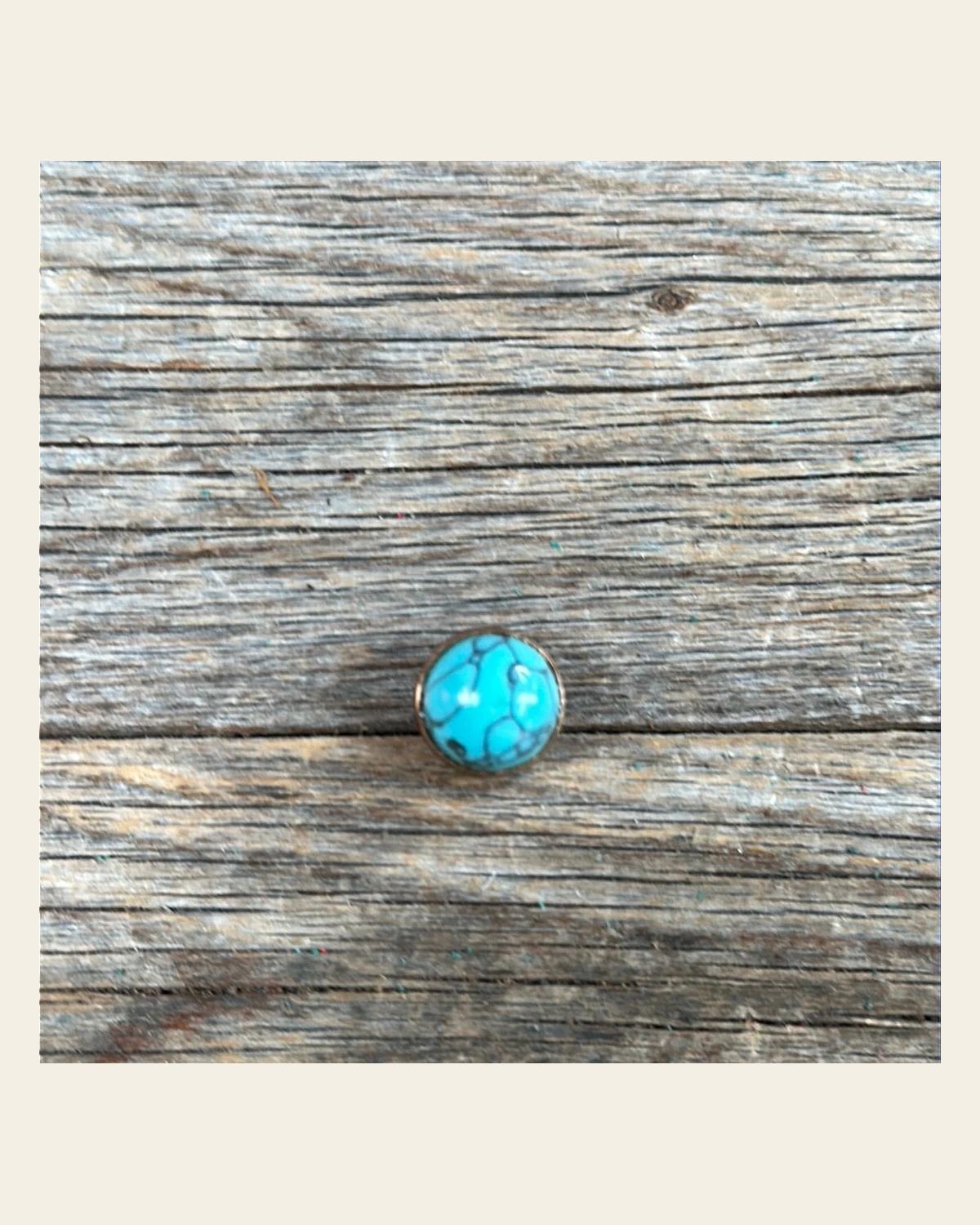 Round Turquoise Cabochon Western Concho 1/2" CABTQR on a warm cream background