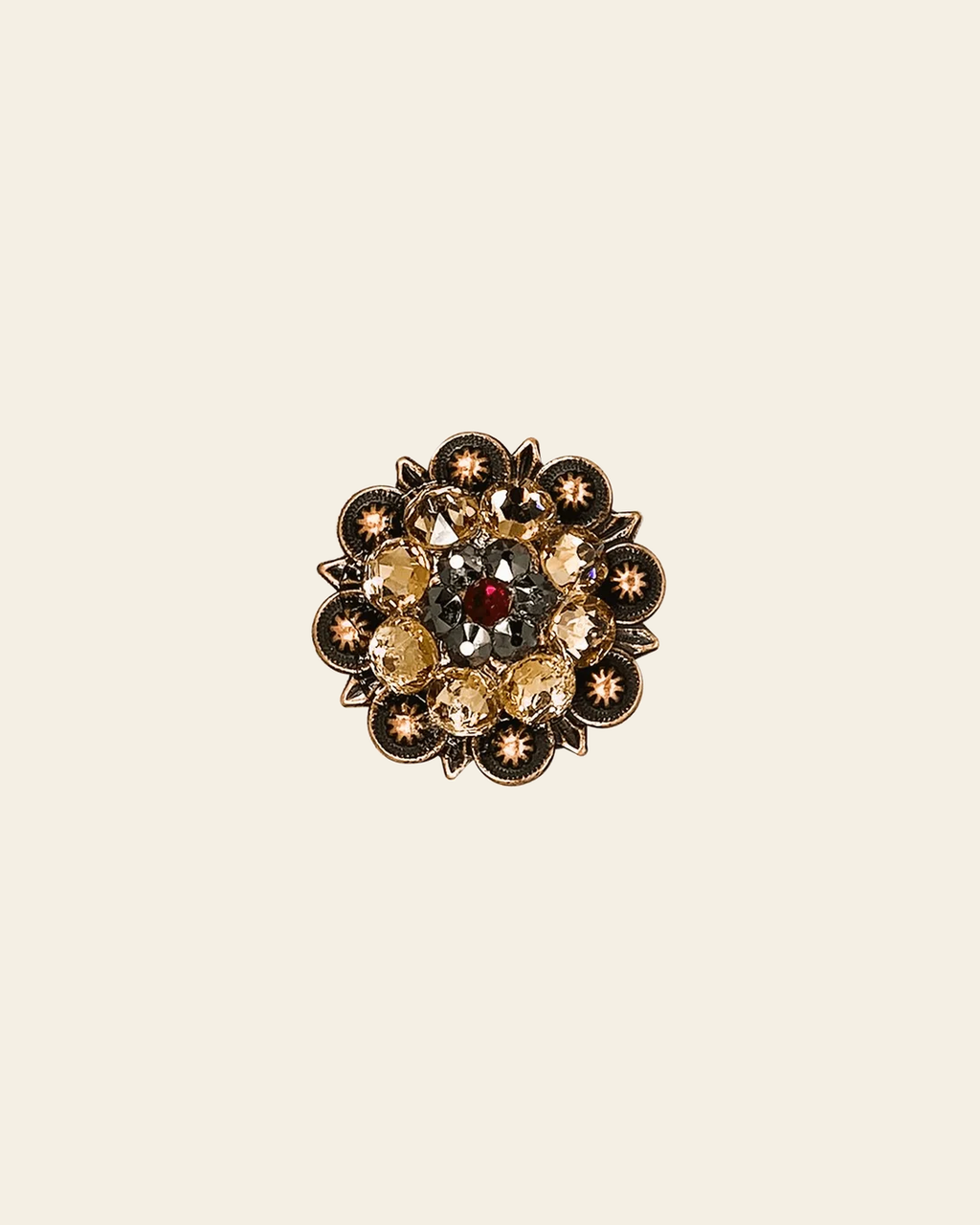 Ruby Jet & Champagne Copper 1.25" European Crystal Concho on a warm cream background