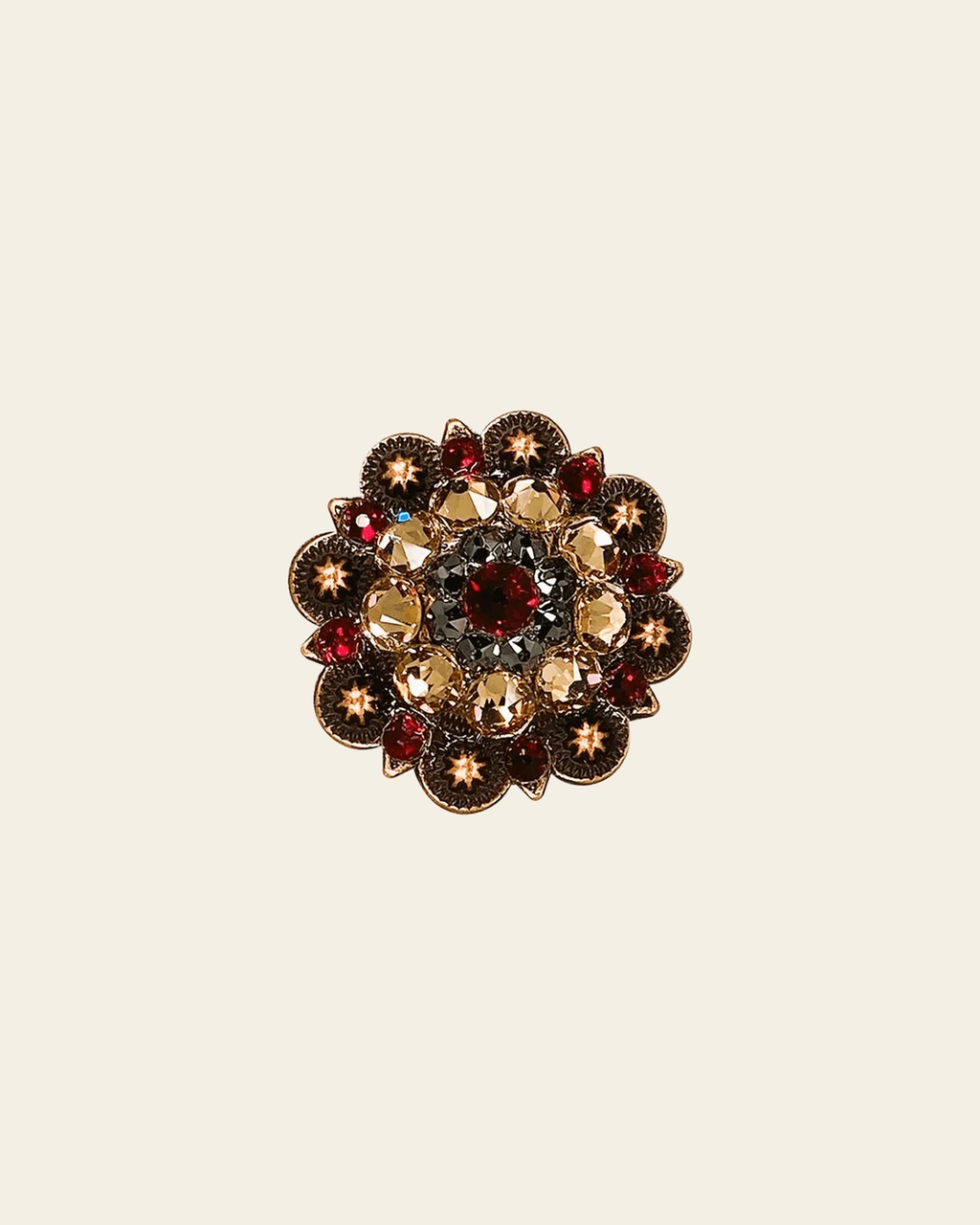 Ruby Jet & Champagne Copper 1.5" European Crystal Concho on a warm cream background