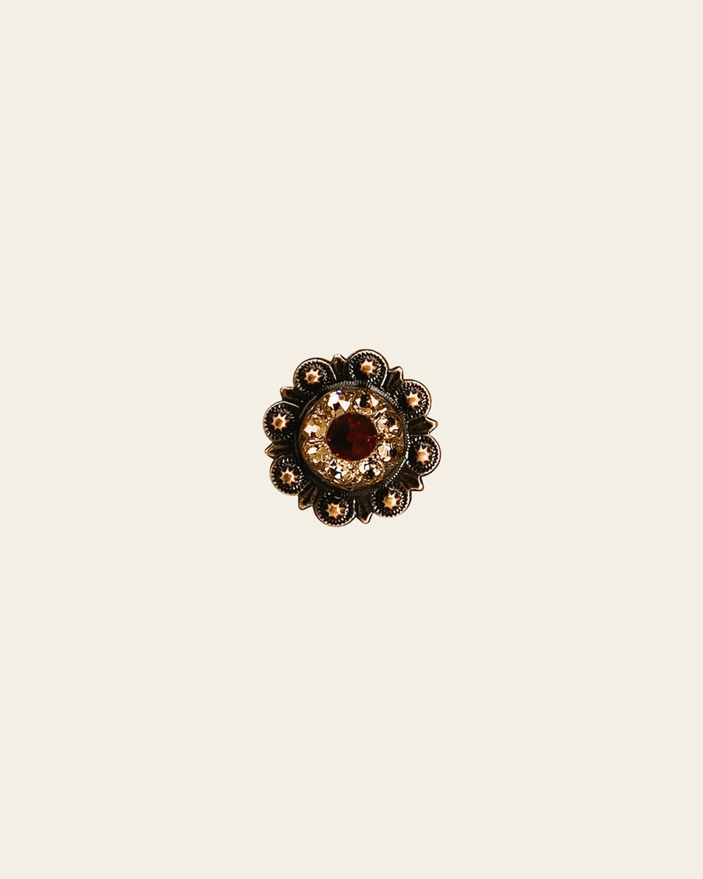 Ruby & Champagne Copper 1" European Crystal Concho on a warm cream background