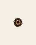Ruby & Champagne Copper 1" European Crystal Concho on a warm cream background