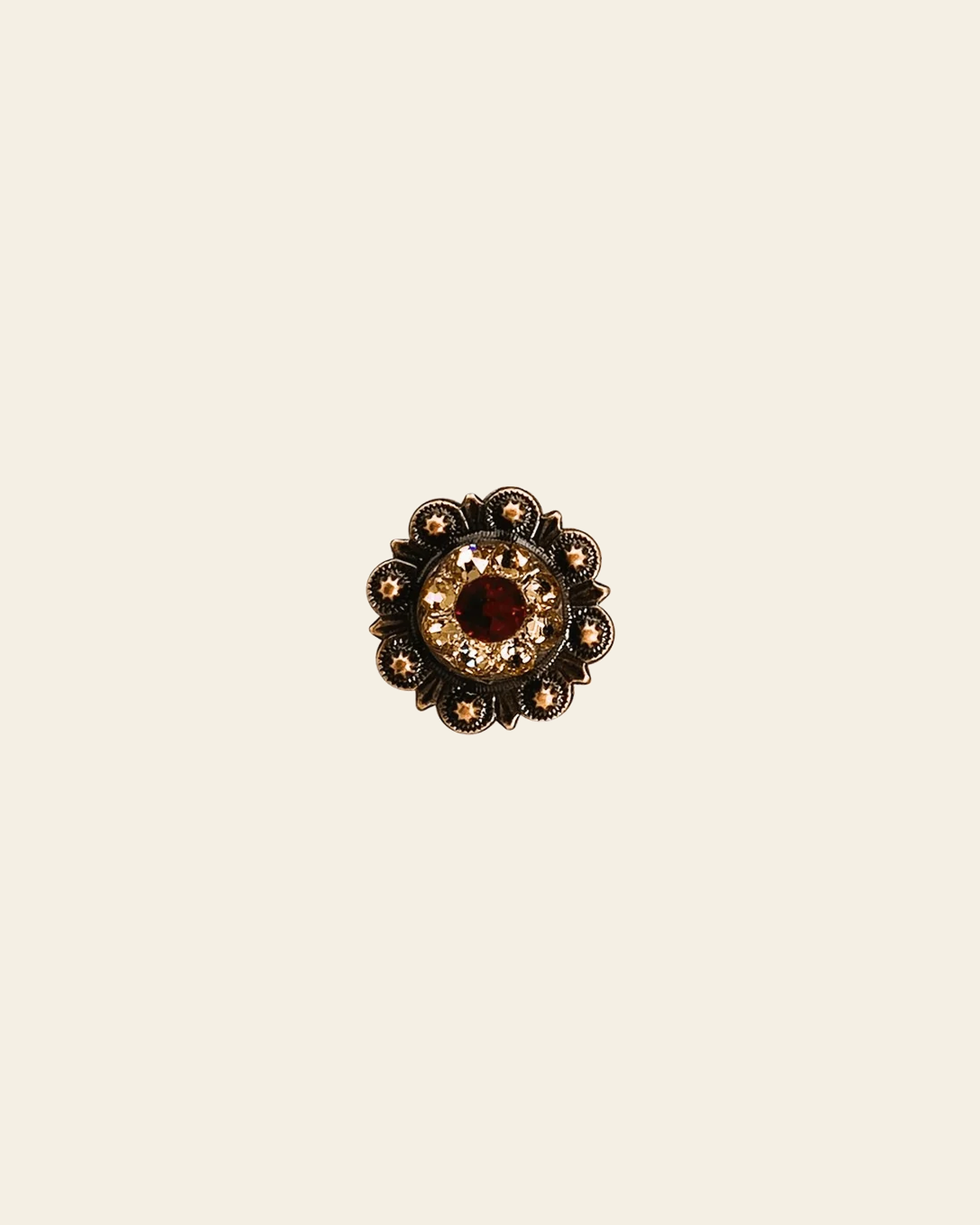 Ruby & Champagne Copper 1" European Crystal Concho on a warm cream background