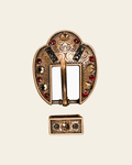 Ruby Jet & Champagne Copper European Crystal Fancy Buckle on a warm cream background