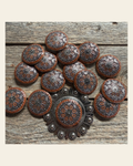 Rust Filigree and Dots Western Concho W233 on a warm cream background