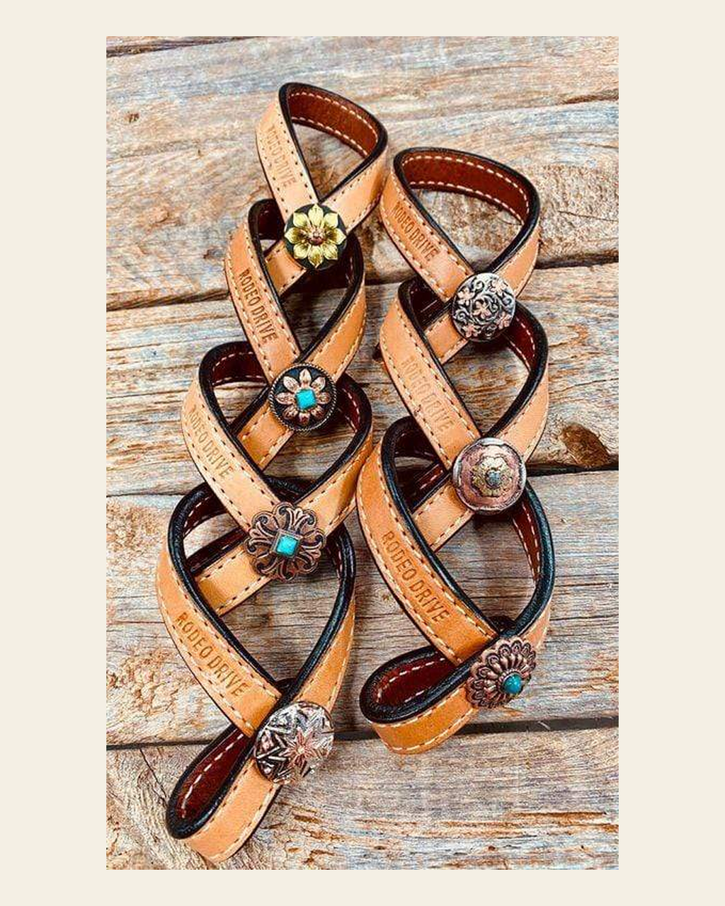 Western Light Oil Rustic Tie Down Keepers on a warm cream background