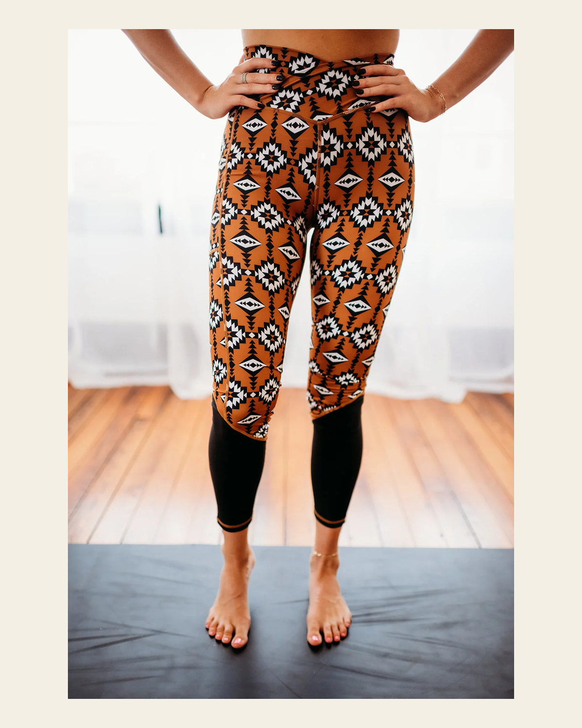 Sandstorm Crossover Leggings on a warm cream background