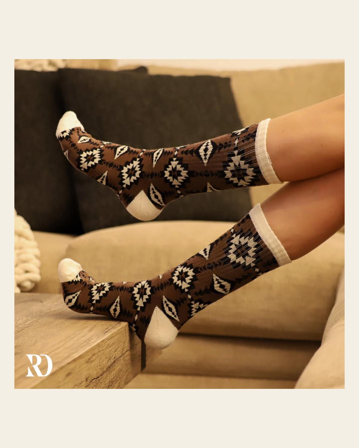 Sandstorm Socks on a warm cream background