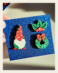 set of 3 Gnome Wreath Holly Hat Pins Christmas Made in America on a warm cream background