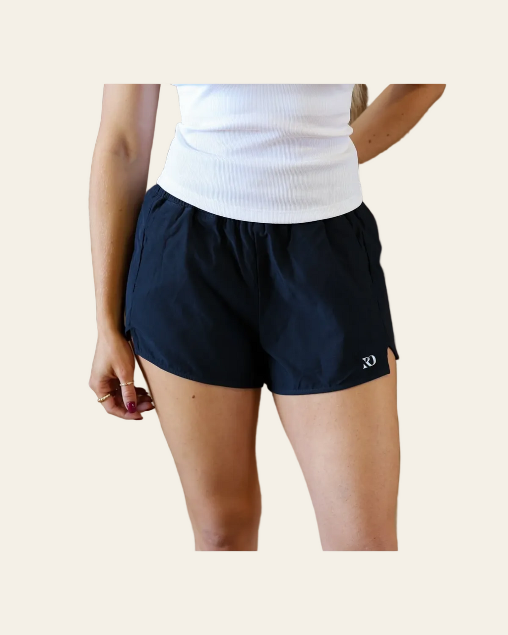 Essentials Shorts | Navy on a warm cream background