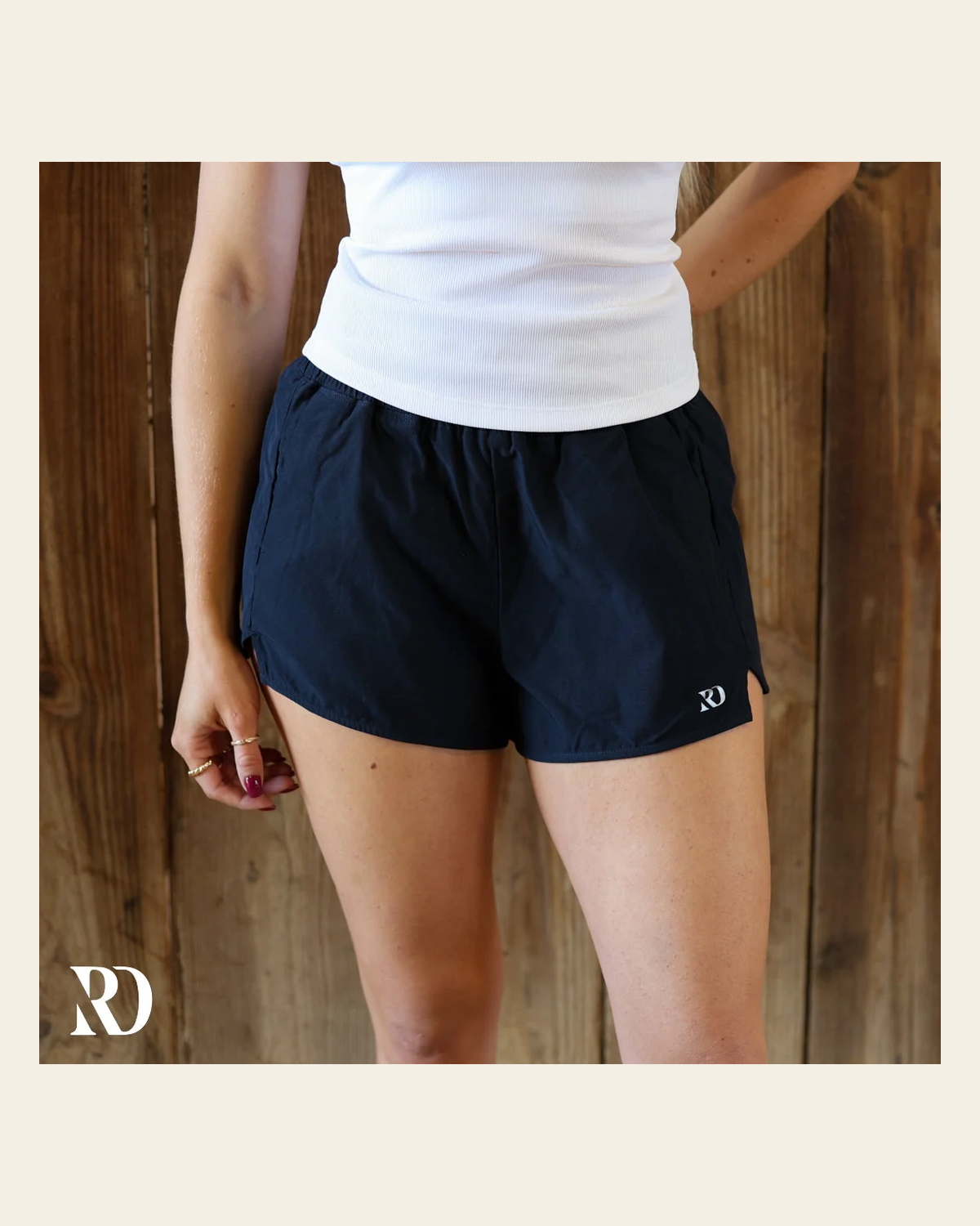 Essentials Shorts | Navy on a warm cream background