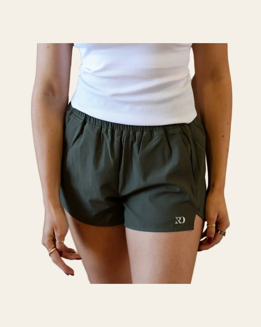 Essentials Shorts | Olive on a warm cream background