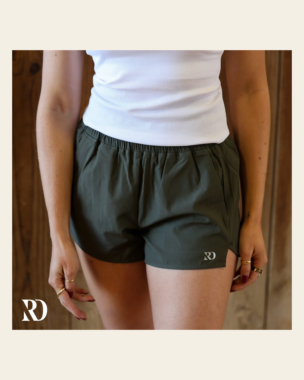 Essentials Shorts | Olive on a warm cream background