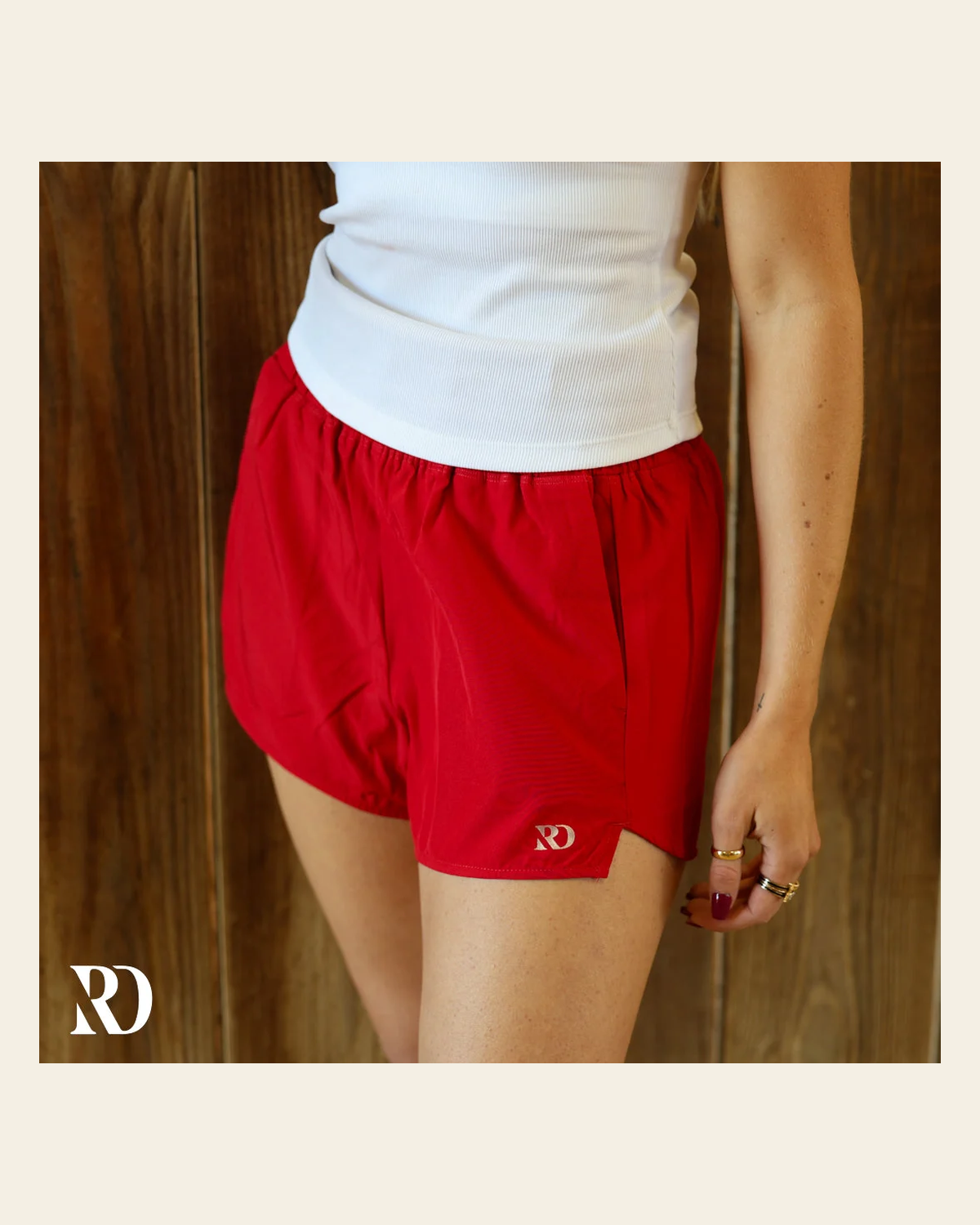 Essentials Shorts | Red on a warm cream background