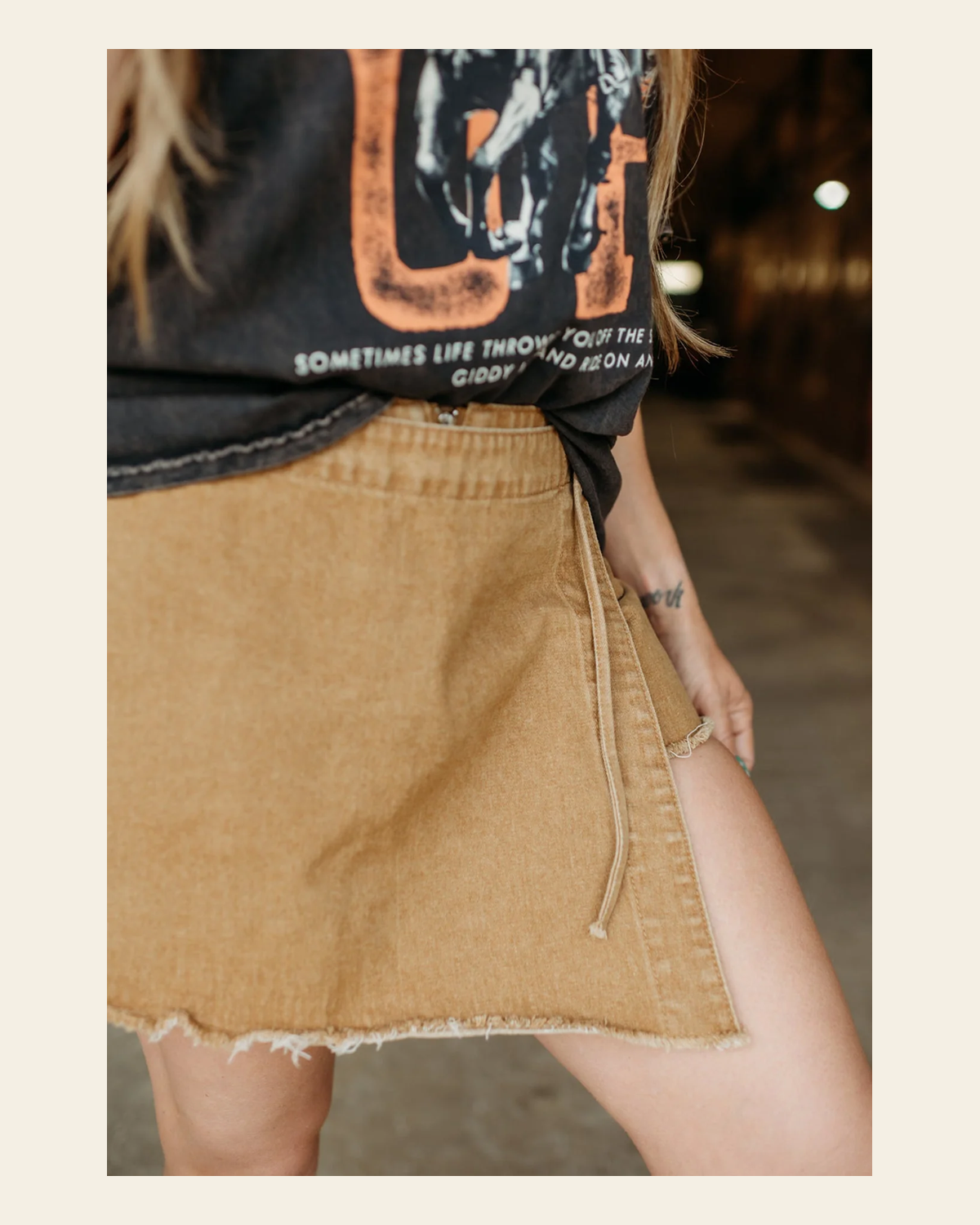 Cora Camel Skort With Side Tie on a warm cream background