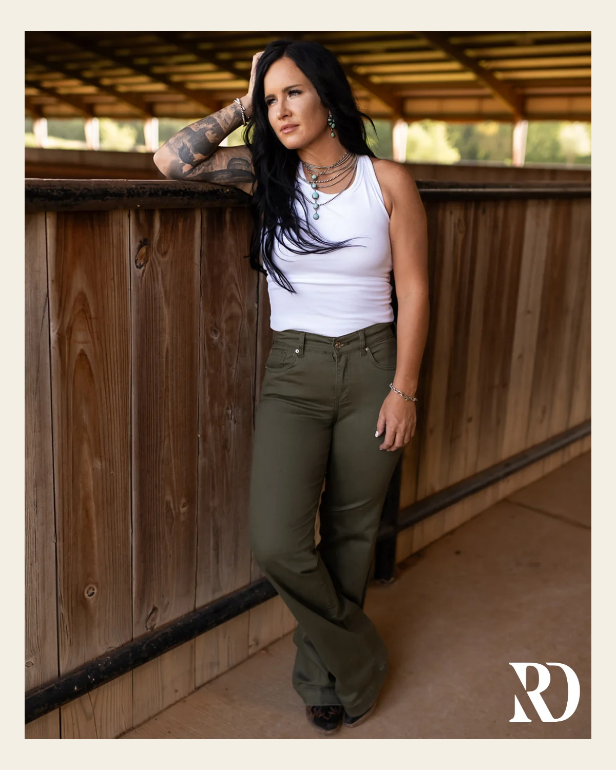 Signature Trouser - Sage on a warm cream background