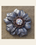 Silver Carnation Flower With Copper AB 1" Concho on a warm cream background