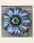 Silver Carnation Flower With Copper Fern, Clear 1" Concho on a warm cream background