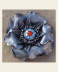 Silver Gardenia Flower With Antique Silver Fire Opal and Aqua 1" Concho on a warm cream background