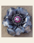 Silver Gardenia Flower With Antique Silver Fuchsia and AB 1" Concho on a warm cream background
