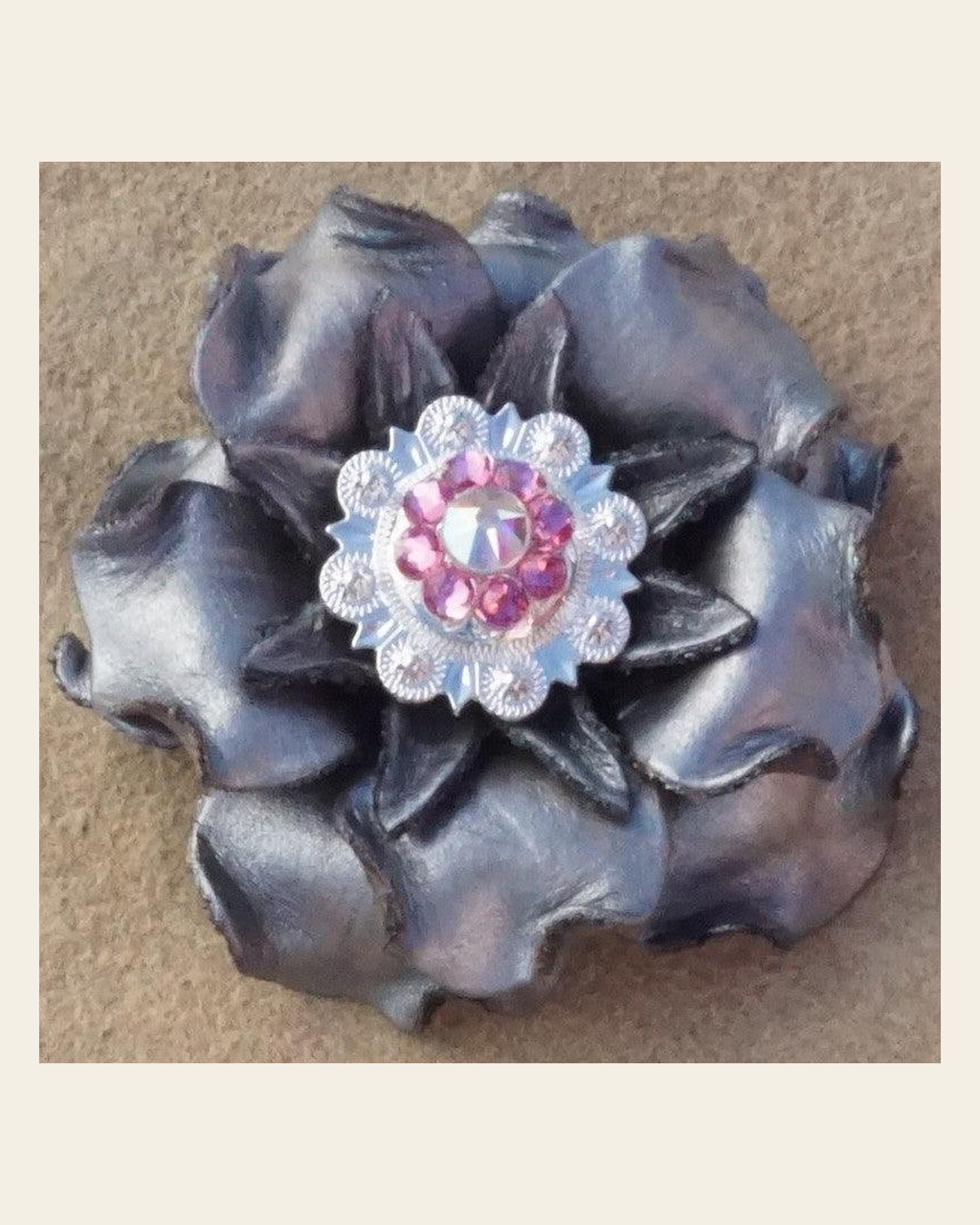 Silver Gardenia Flower With Bright Silver Pink and AB 1" Concho on a warm cream background