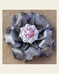 Silver Gardenia Flower With Bright Silver Pink and AB 1" Concho on a warm cream background