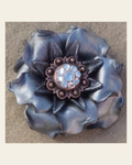 Silver Gardenia Flower With Copper Clear 1" Concho on a warm cream background