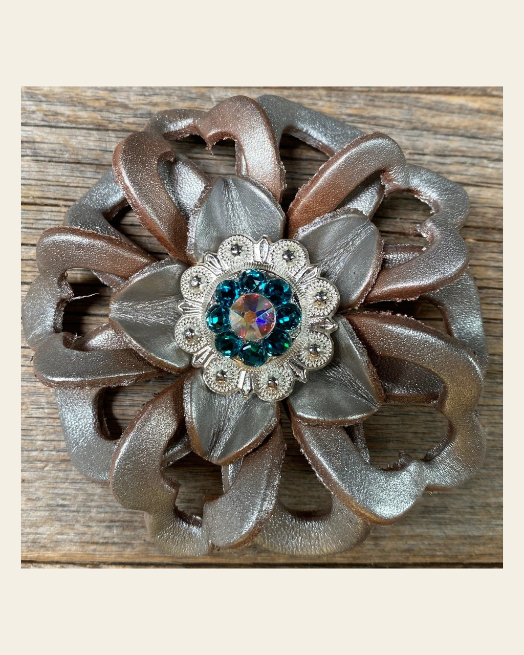 Silver Lotus Flower With Bright Silver Teal & AB 1" Concho on a warm cream background