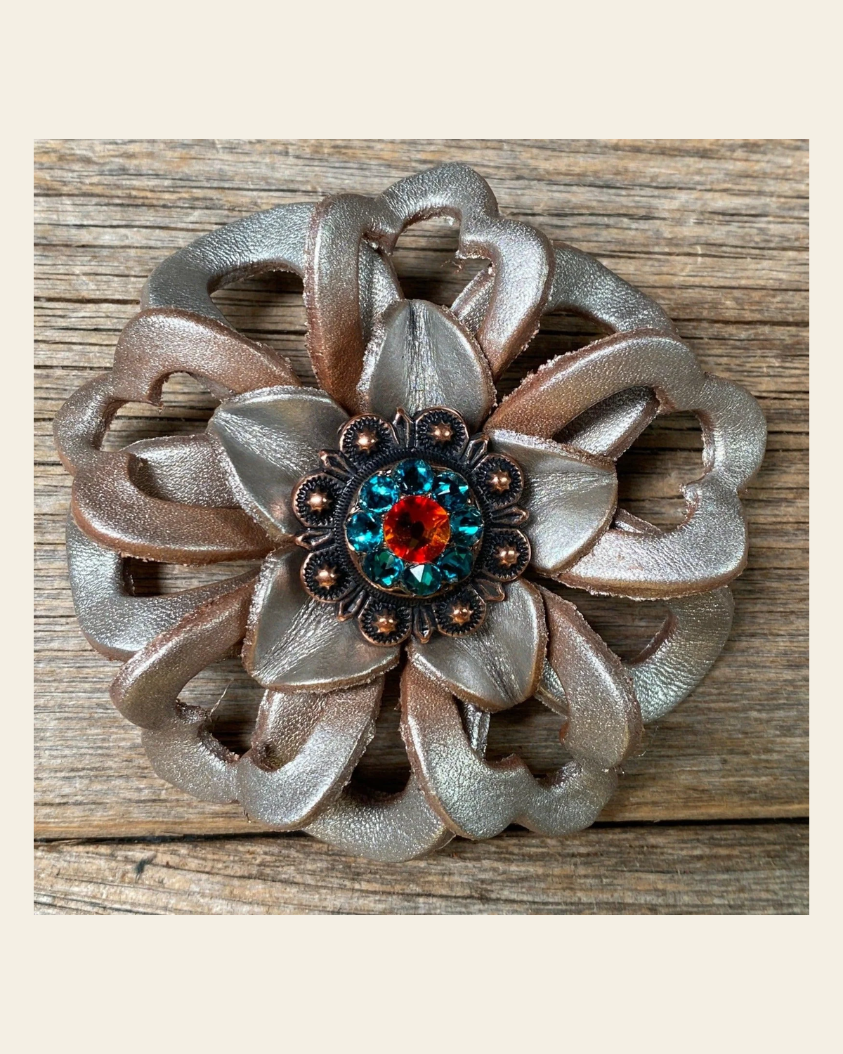 Silver Lotus Flower With Copper Fire Opal & Teal 1" Concho on a warm cream background
