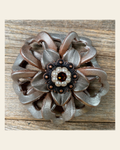 Silver Lotus Flower With Copper Topaz & Pearl 1" Concho on a warm cream background