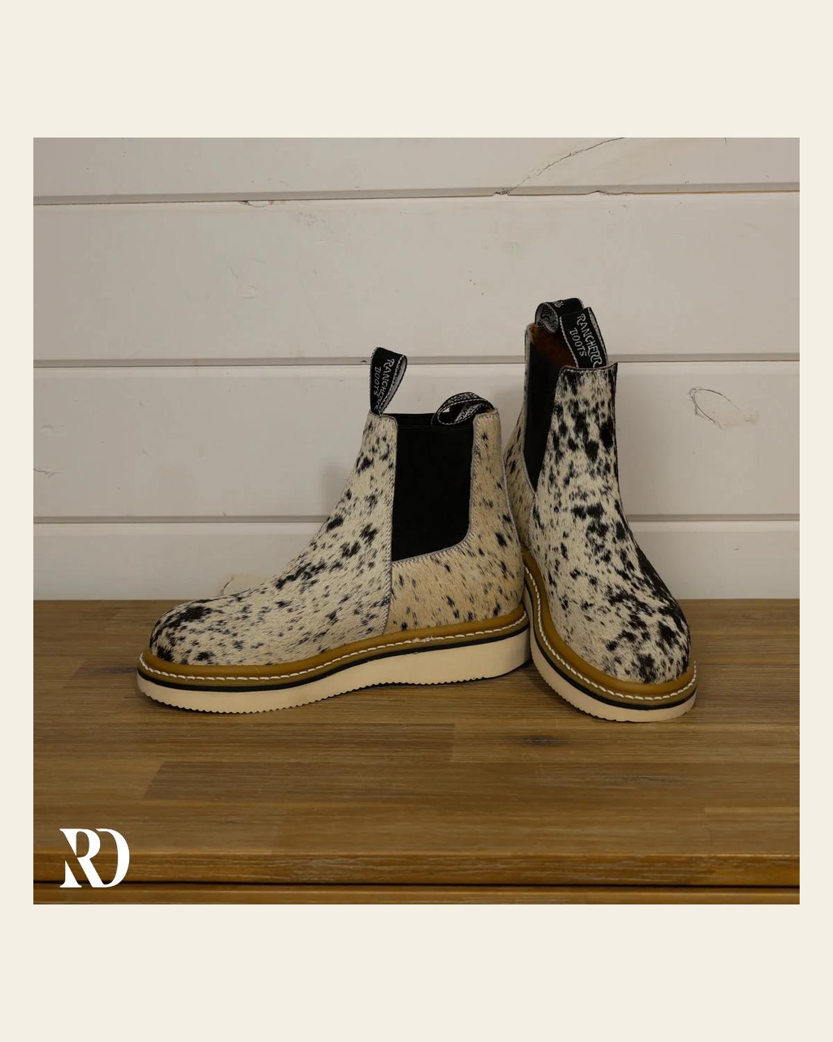 Size 7 (style #262) | Hair On Hide Lechera Boot on a warm cream background