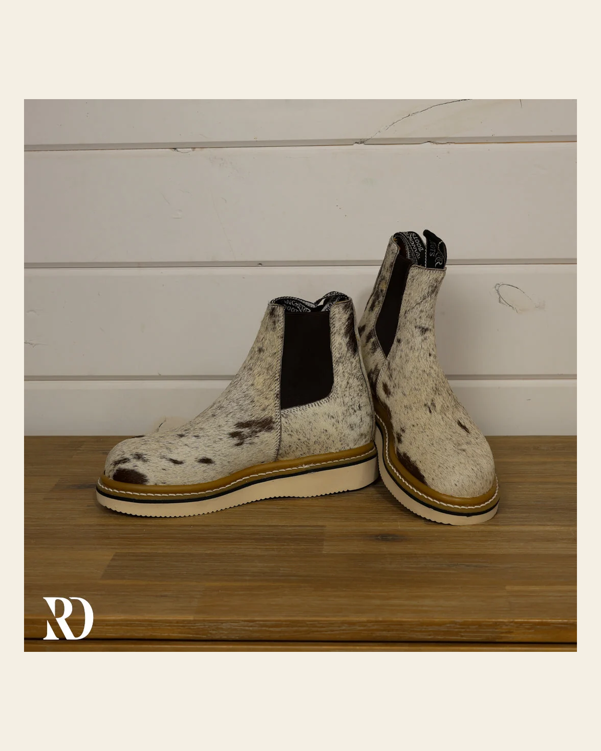 Size 7 (style #264) | Hair On Hide Lechera Boot on a warm cream background