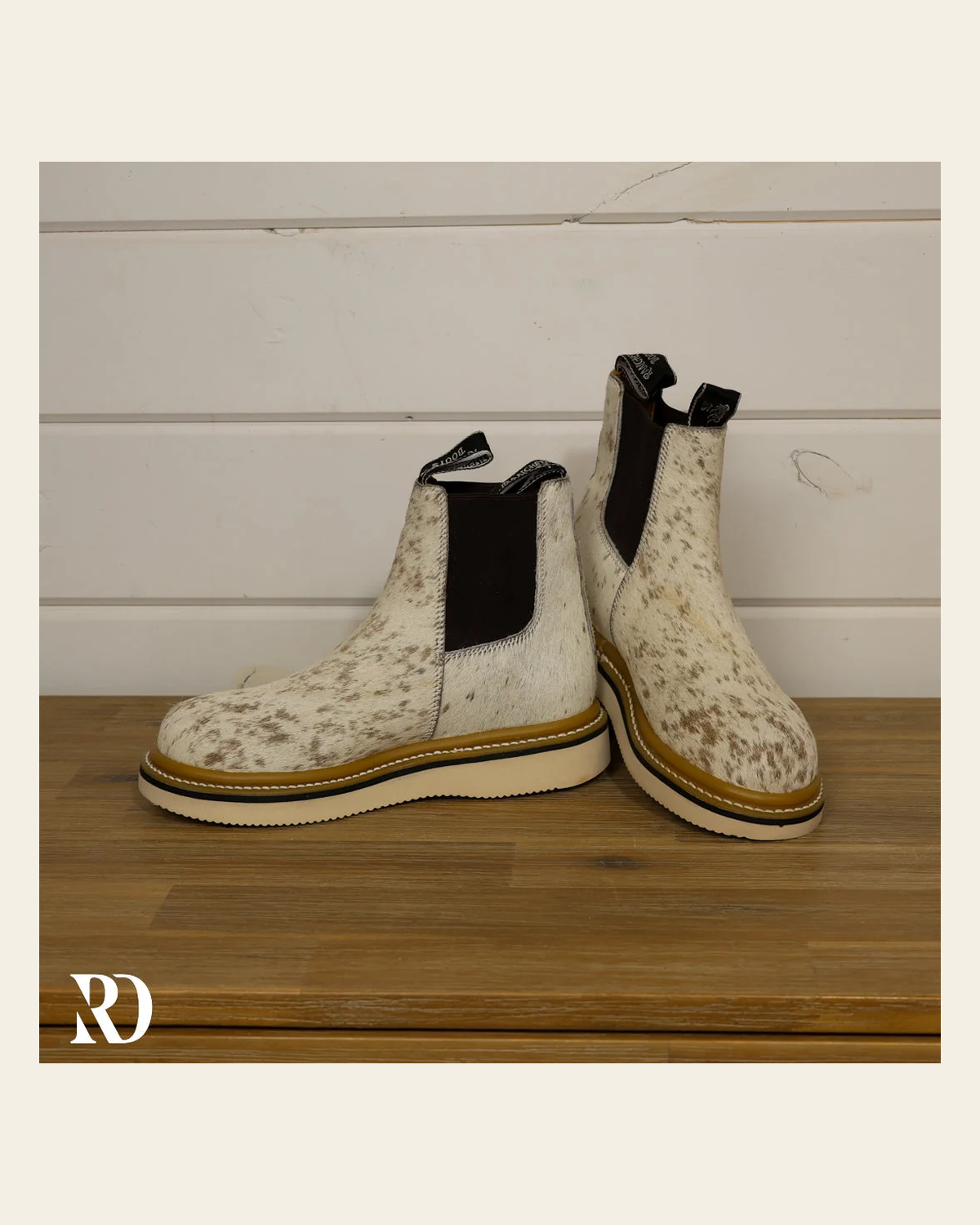 Size 7 (style #269) | Hair On Hide Lechera Boot on a warm cream background