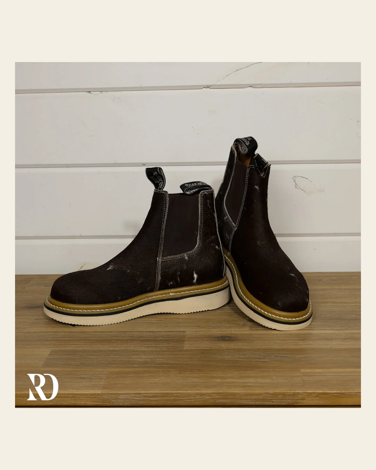 Size 7 (style #273) | Hair On Hide Lechera Boot on a warm cream background