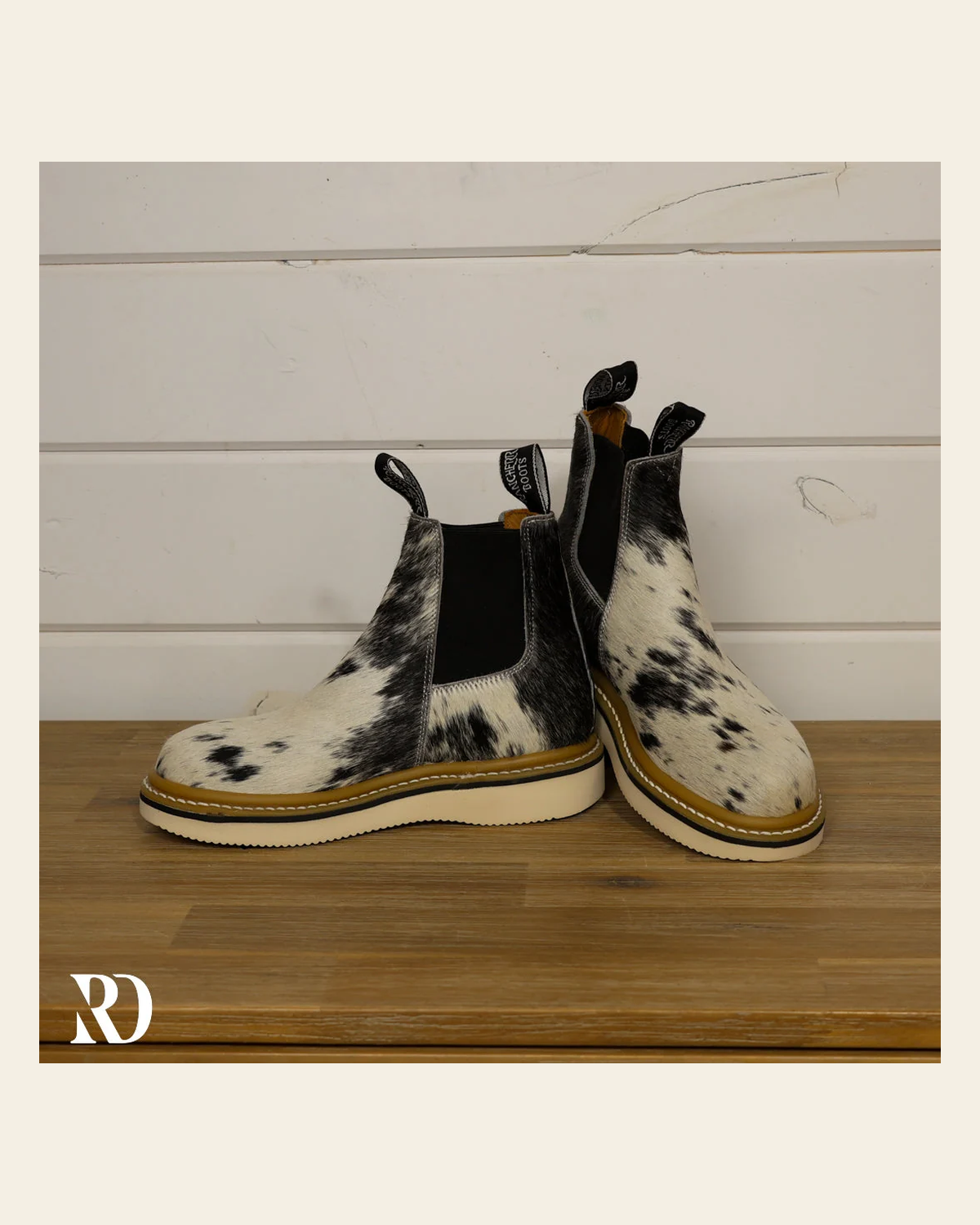 Size 7 (style #279) | Hair On Hide Lechera Boot on a warm cream background