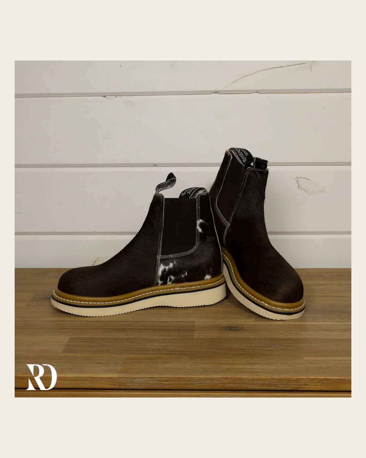 Size 7 (style #283) | Hair On Hide Lechera Boot on a warm cream background