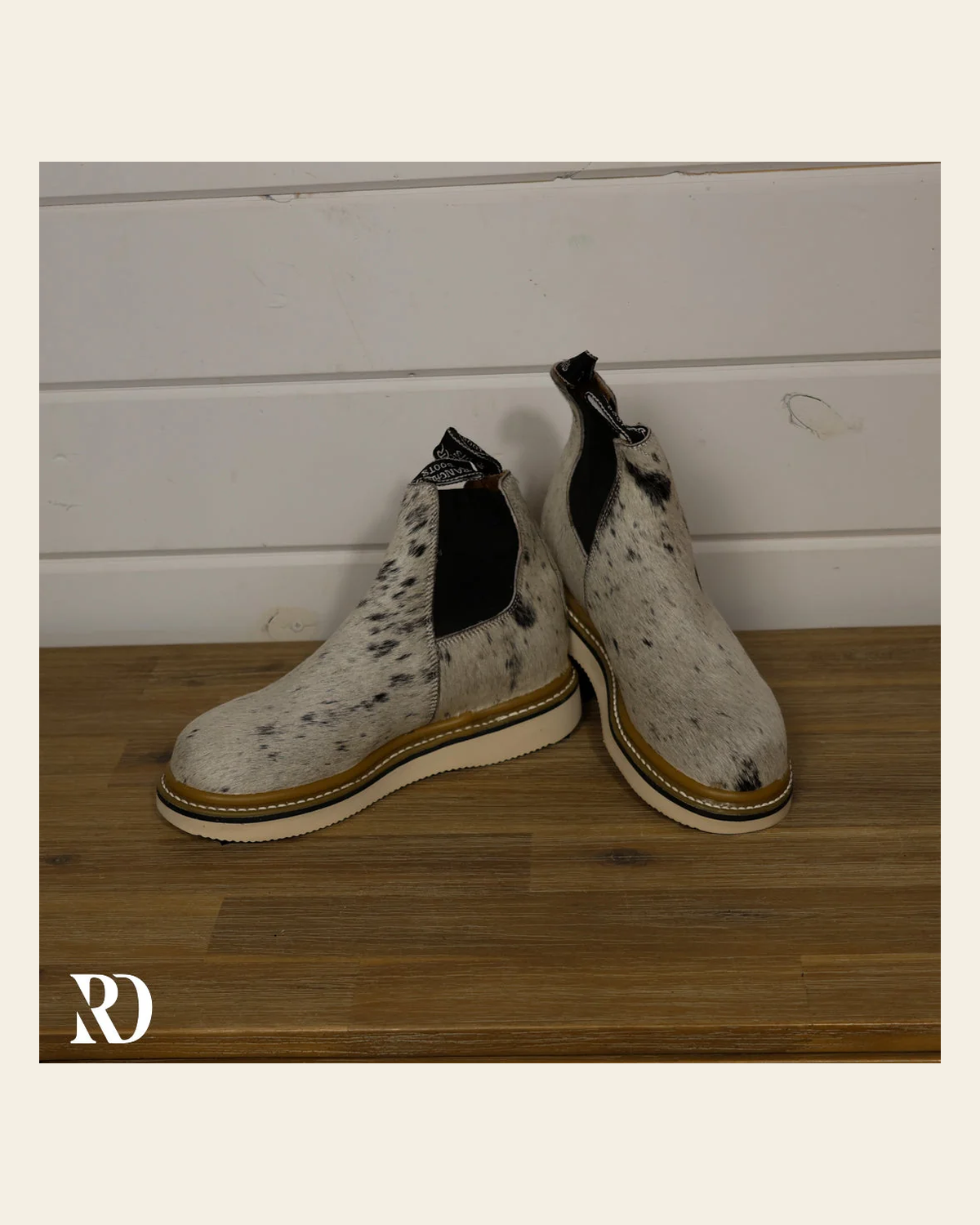 Size 8 (style #57) | Hair On Hide Lechera Boot on a warm cream background