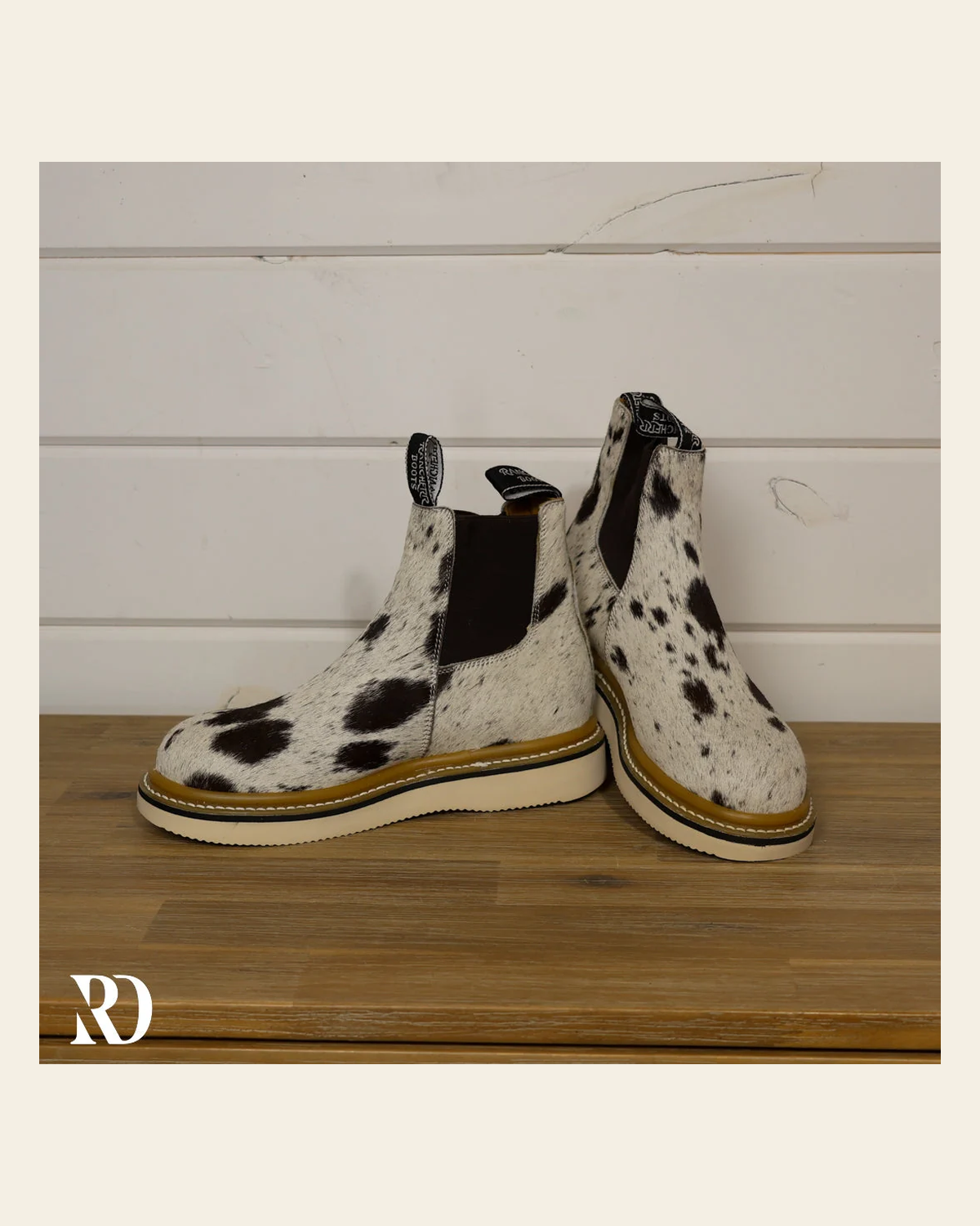 Size 8 (style #323) | Hair On Hide Lechera Boot on a warm cream background