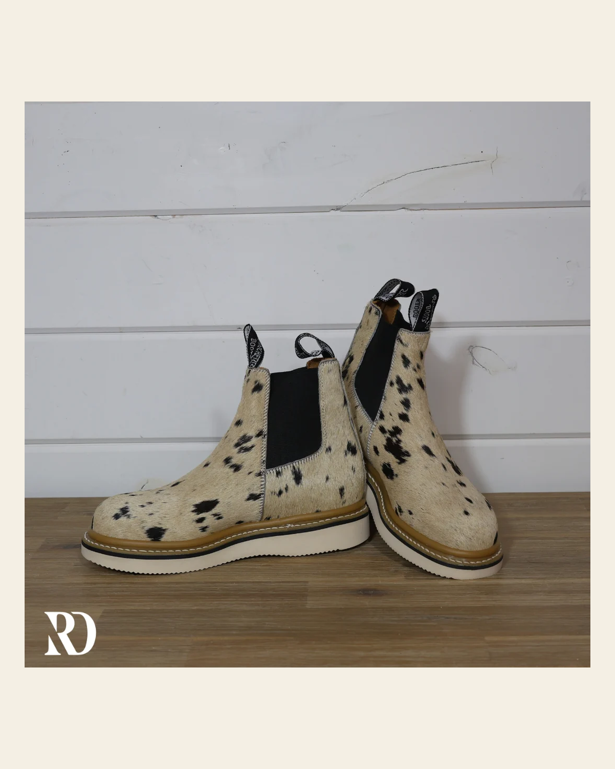 Size 8 (style #397) | Hair On Hide Lechera Boot on a warm cream background