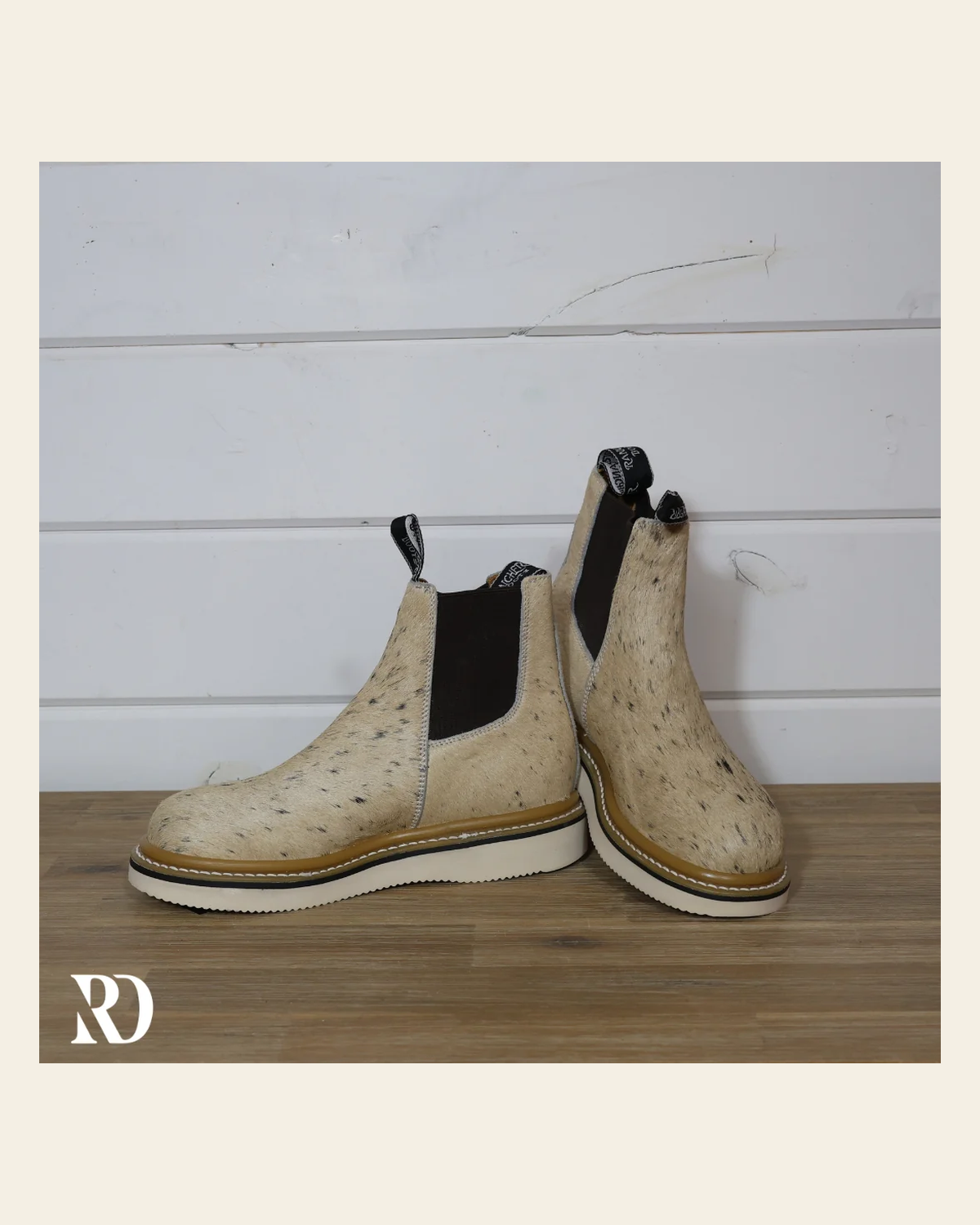 Size 8 (style #405) | Hair On Hide Lechera Boot on a warm cream background
