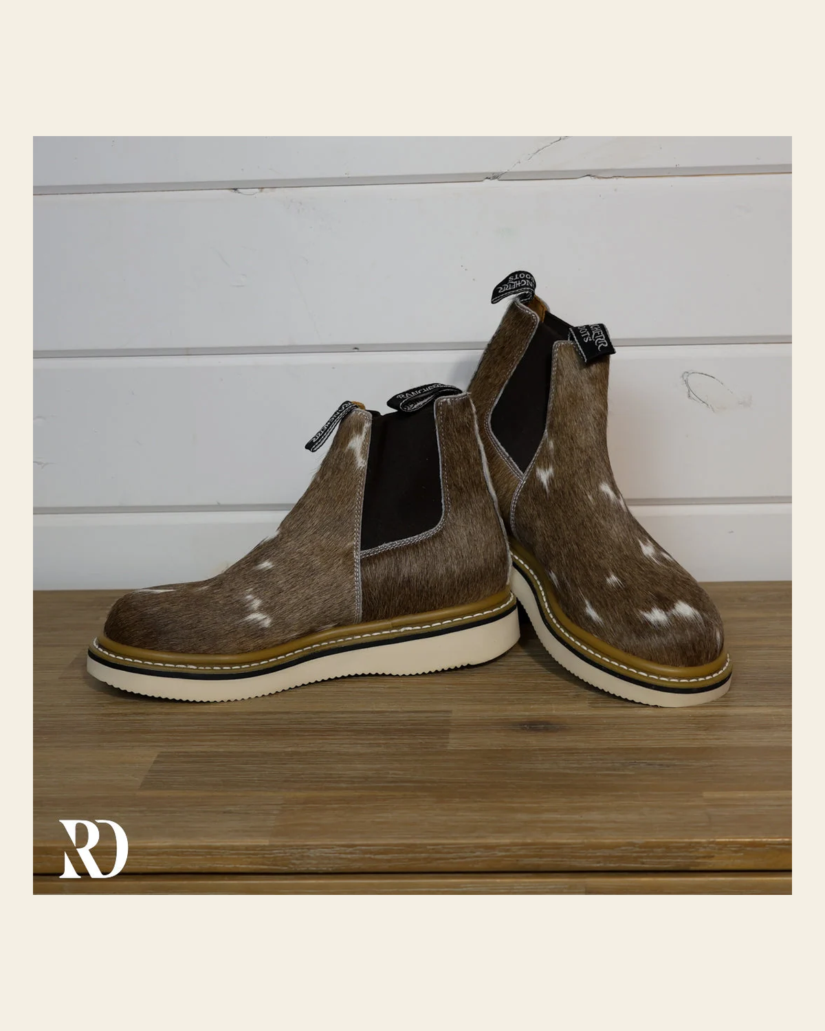 Size 9 (style #225) | Hair On Hide Lechera Boot on a warm cream background