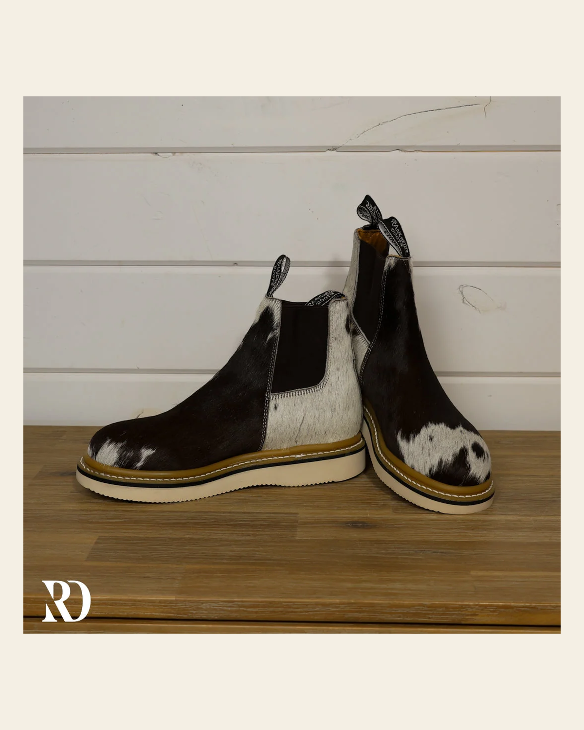 Size 9 (style #348) | Hair On Hide Lechera Boot on a warm cream background