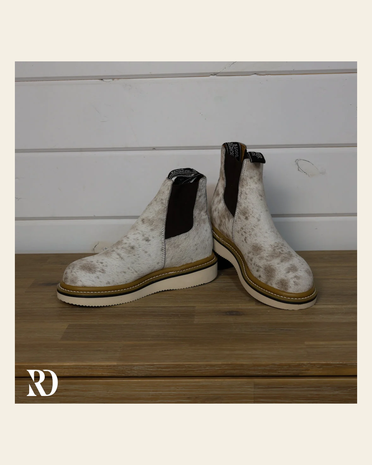 Size 6 (style #107) | Hair On Hide Lechera Boot on a warm cream background