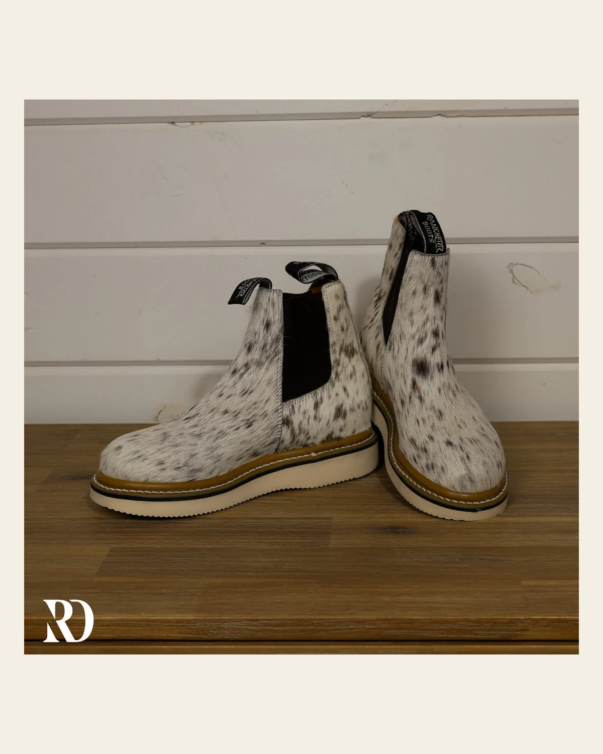 Size 7 (style #123) | Hair On Hide Lechera Boot on a warm cream background