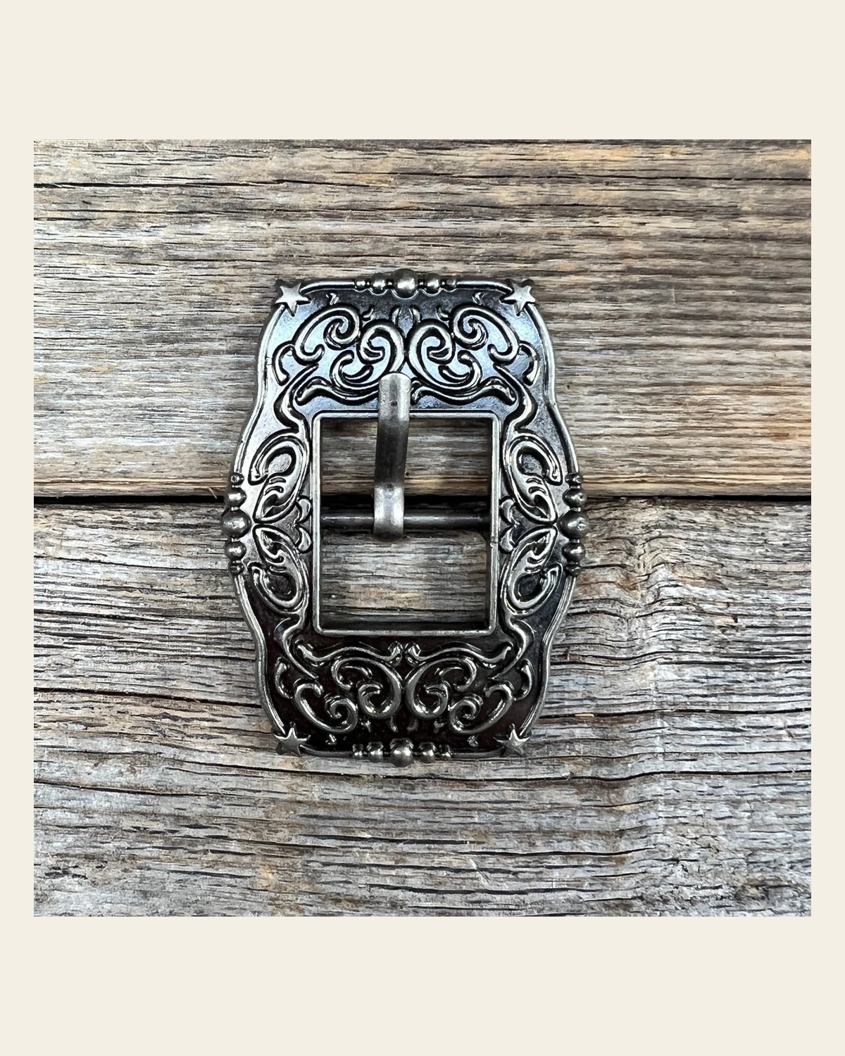 Small Star Antique Silver Cart Buckle W177B on a warm cream background