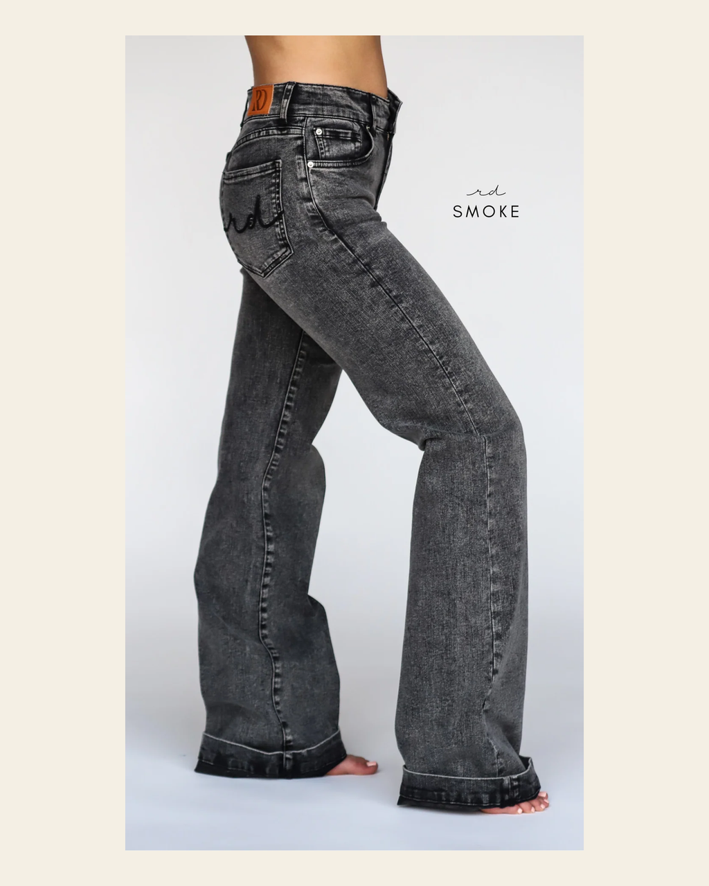 Smoke Signature Trouser Denim on a warm cream background