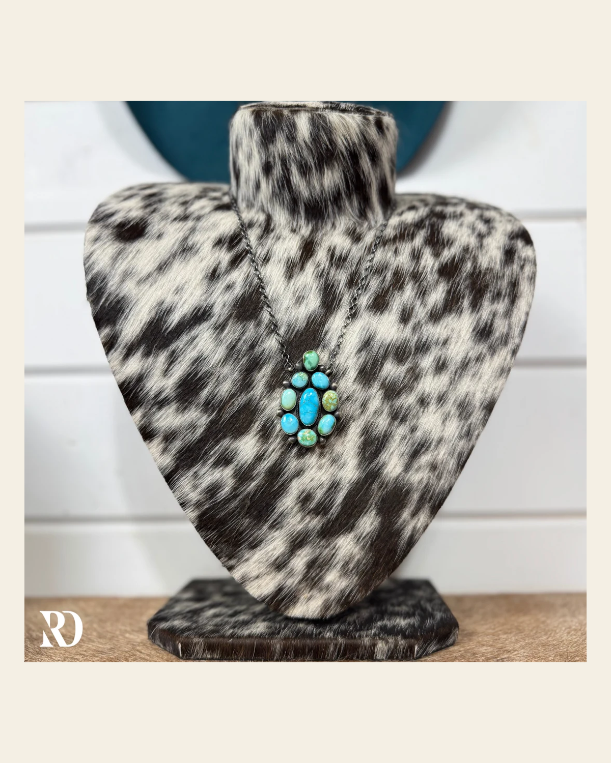 Sonoran Gold Turquoise Cluster Stone Necklace By Tricia Smith on a warm cream background