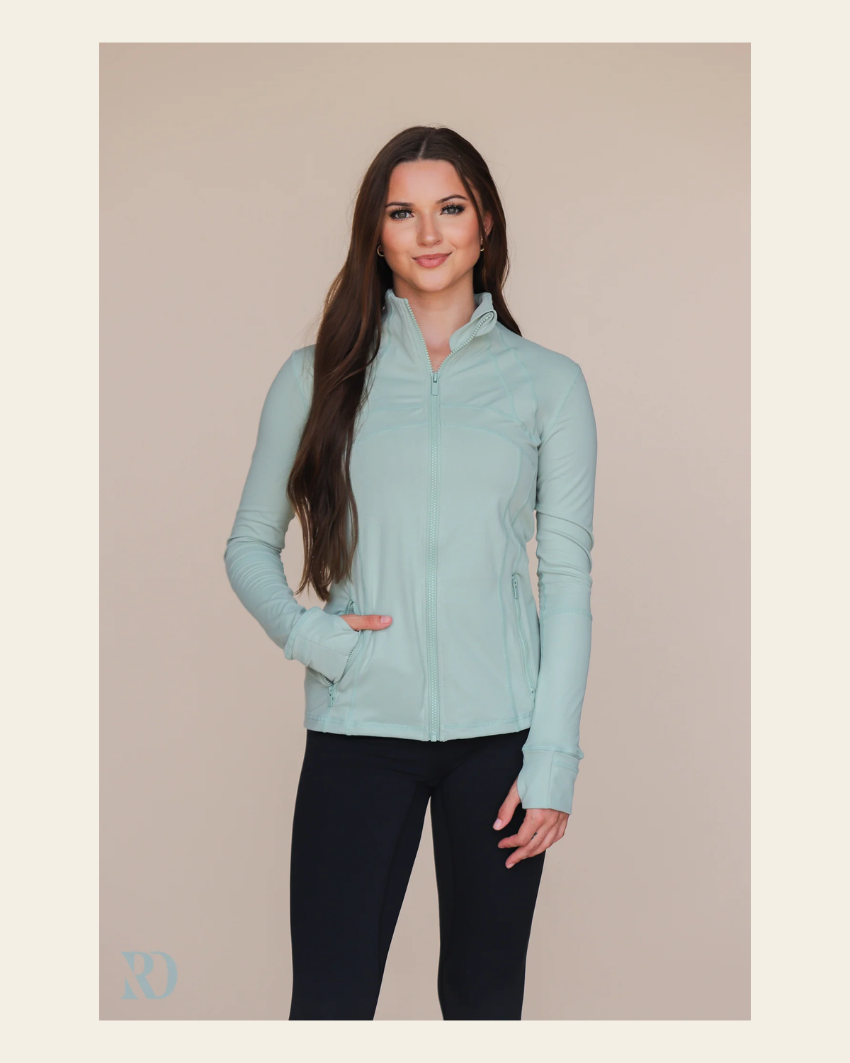 Sleek Jacket | Spruce on a warm cream background